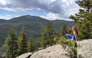 Jo looking out from outcrop