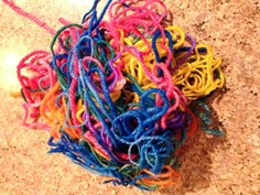 colorful strands of yarn tangled